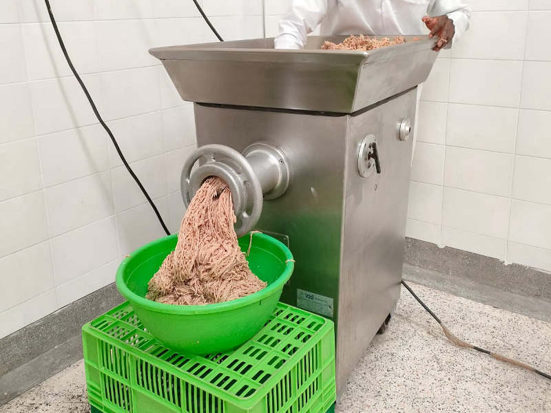 Beef mince ground fresh to order on the Kamundia Butchery Nairobi processing floor at City Market, Nairobi